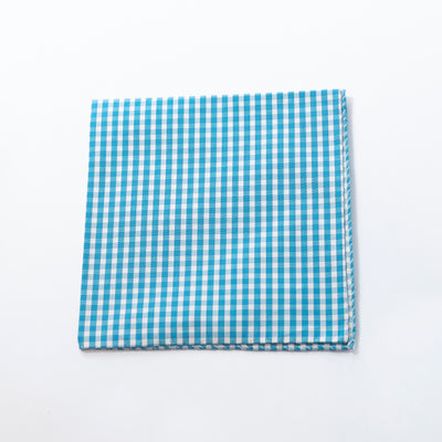Add a splash of colour to your pocket with Berg & Berg's Gingham Cotton Pocket Square! Crafted from breathable cotton and boasting a mint condition, this vibrant aqua and white accessory is the perfect choice for risk-takers who dare to stand out. Make a bold statement today!